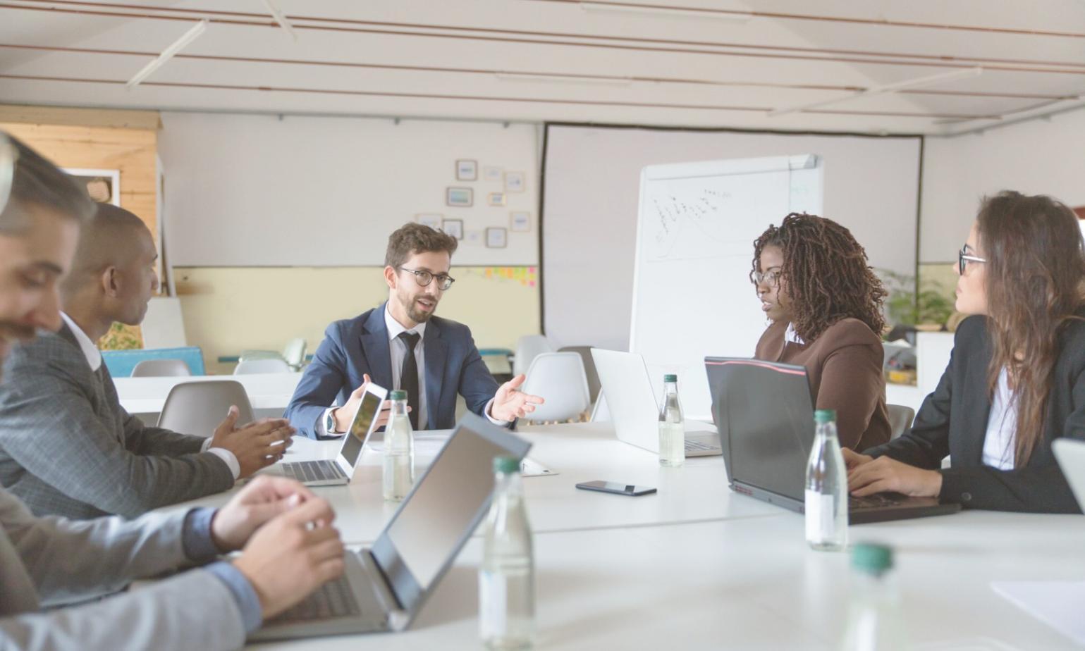 Professional financial planning workspace with organized budget materials