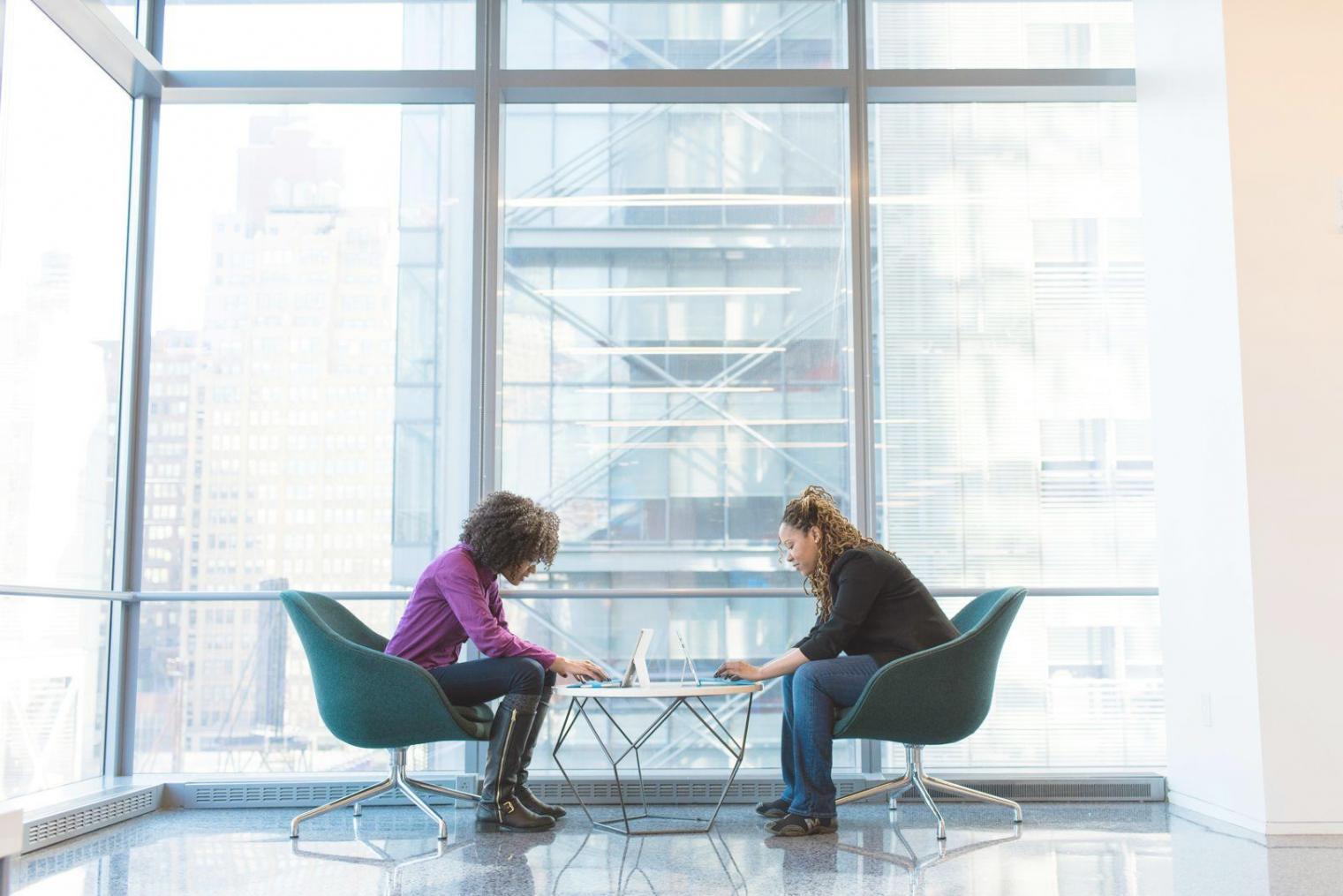 Workshop environment showing collaborative budget planning and financial education